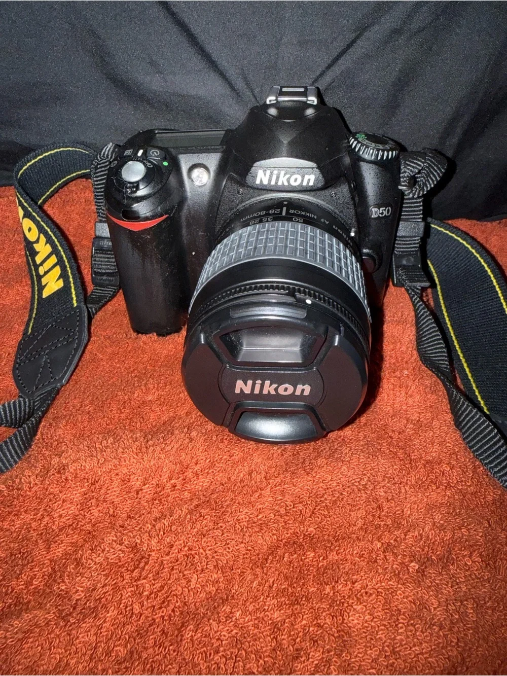Nikon DSLR Camera Kit with Black Lowepro Bag and Yellow-Accented Strap